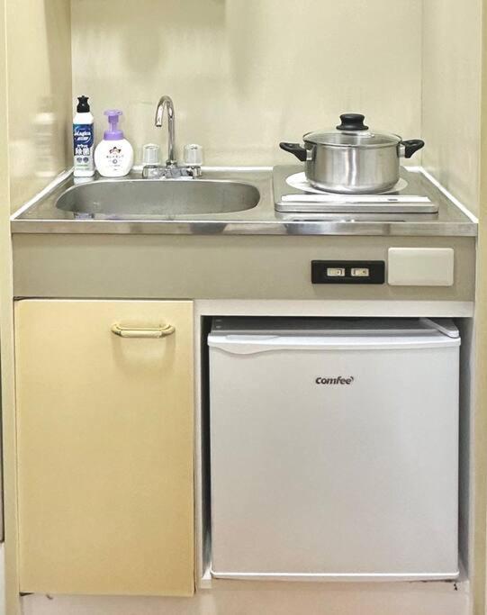 Appartement 105号室花園駅2分ツインベットルームミニキッチンと専用バスルーム付き